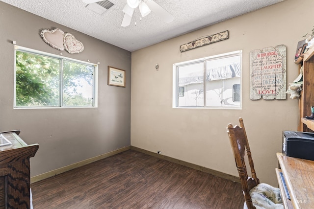 19550 Whitecap Ct, Wilder, ID 83676 - office with wood finished floors, a textured ceiling, ceiling fan, and baseboards