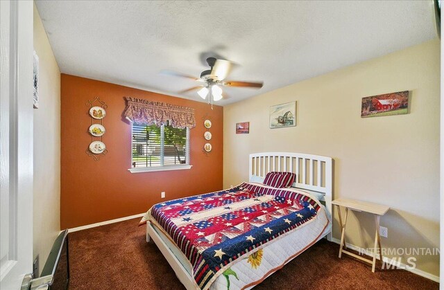 1207 Empire Ct, Caldwell, ID 83607 - bedroom featuring carpet floors, baseboards, and a ceiling fan