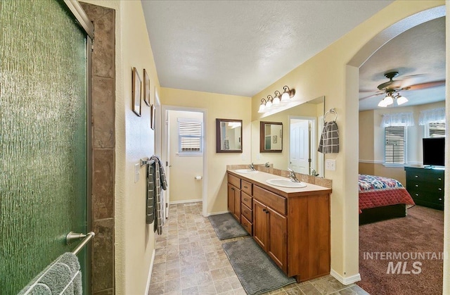 1207 Empire Ct, Caldwell, ID 83607 - full bathroom with plenty of natural light, a ceiling fan, ensuite bath, and double vanity