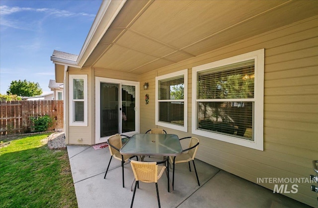 1207 Empire Ct, Caldwell, ID 83607 - view of patio with fence and outdoor dining area
