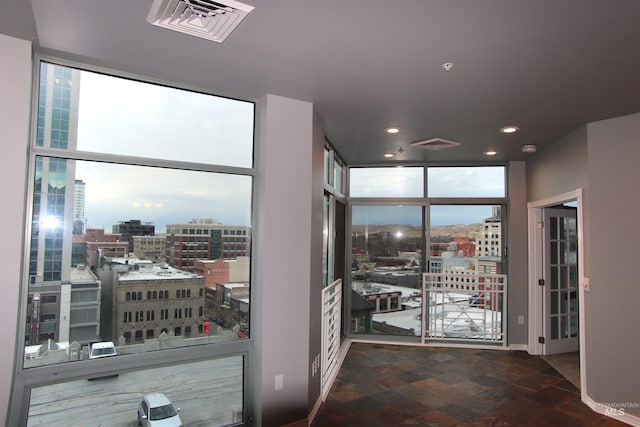 doorway with expansive windows