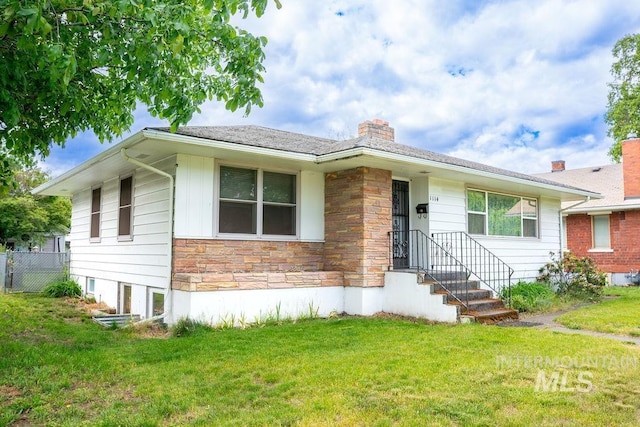 1114 12th Ave, Lewiston, ID 83501 - view of front of house featuring stone siding and a chimney
