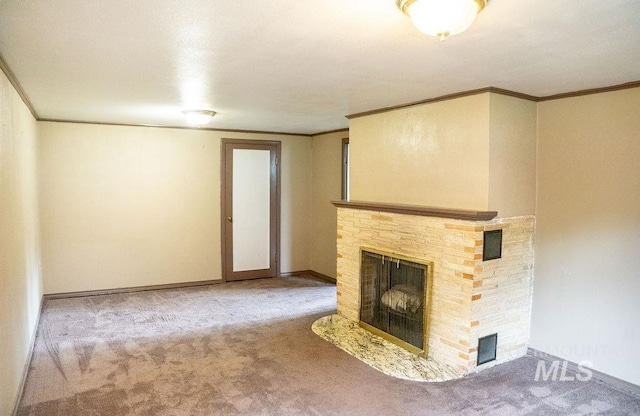 1114 12th Ave, Lewiston, ID 83501 - unfurnished living room with carpet flooring, crown molding, a brick fireplace, and baseboards