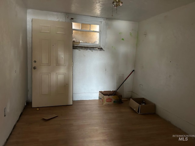 1703 7th Ave, Lewiston, ID 83501 - spare room featuring hardwood / wood-style floors