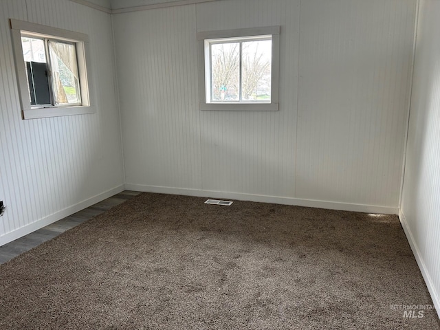 1703 7th Ave, Lewiston, ID 83501 - carpeted spare room with a wealth of natural light