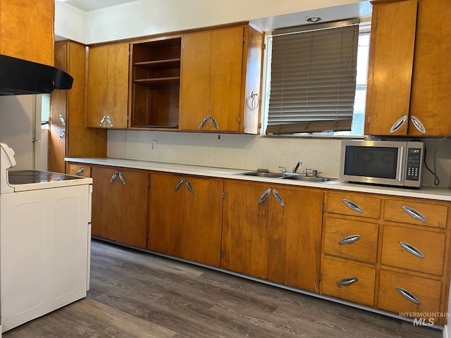 1703 7th Ave, Lewiston, ID 83501 - kitchen featuring dark wood-type flooring, white electric range, extractor fan, and sink