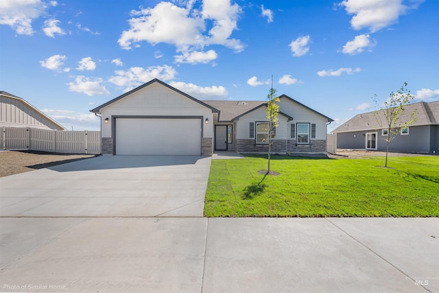 11287 Shadow Glen Dr, Caldwell, ID 83605 - single story home with a garage, driveway, stone siding, and a gate
