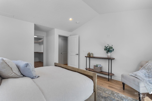 11287 Shadow Glen Dr, Caldwell, ID 83605 - bedroom featuring lofted ceiling, wood finished floors, and recessed lighting