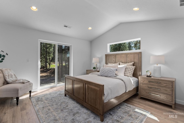 11287 Shadow Glen Dr, Caldwell, ID 83605 - bedroom featuring access to exterior, lofted ceiling, light wood-type flooring, and recessed lighting