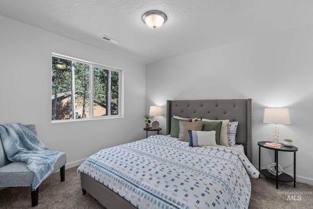 11287 Shadow Glen Dr, Caldwell, ID 83605 - carpeted bedroom with baseboards and a textured ceiling