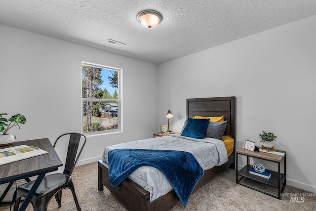 11287 Shadow Glen Dr, Caldwell, ID 83605 - bedroom with carpet, an office area, and a textured ceiling
