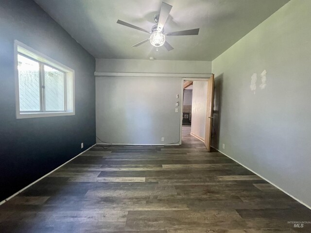 720 W 1st, Fairfield, ID 83327 - spare room featuring wood finished floors, a ceiling fan, and baseboards