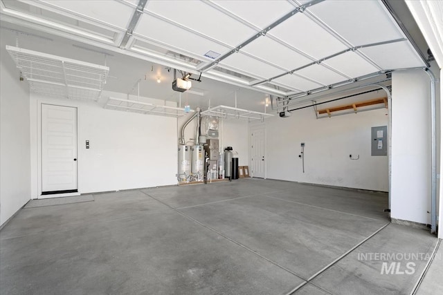 garage featuring electric panel and a garage door opener