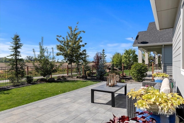 view of patio / terrace featuring fence