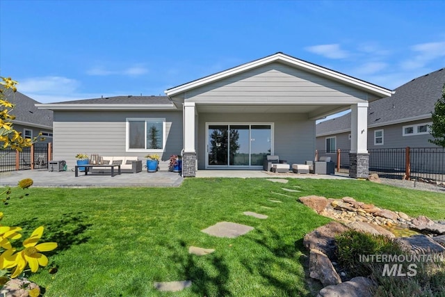 back of house with central AC, a patio area, a lawn, fence, and an outdoor hangout area
