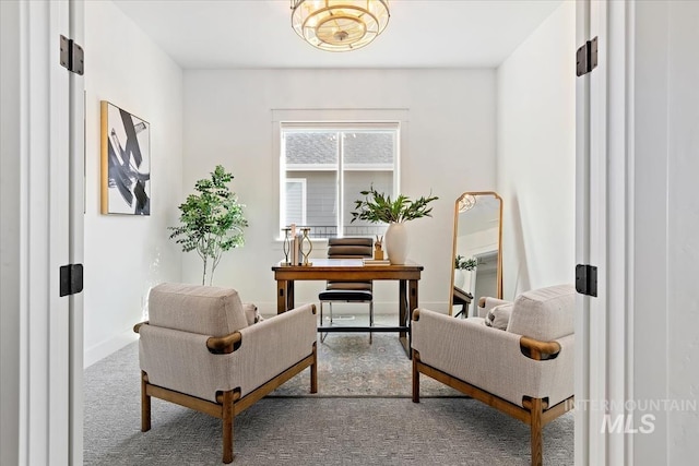 office space with baseboards