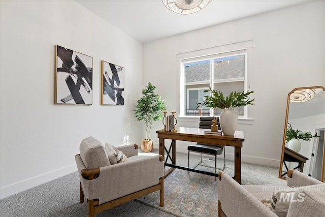 office space with carpet floors and baseboards