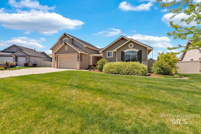855 N Morley Green Pl, Eagle, ID 83616 - view of front of home featuring a garage, a front lawn, fence, and concrete driveway