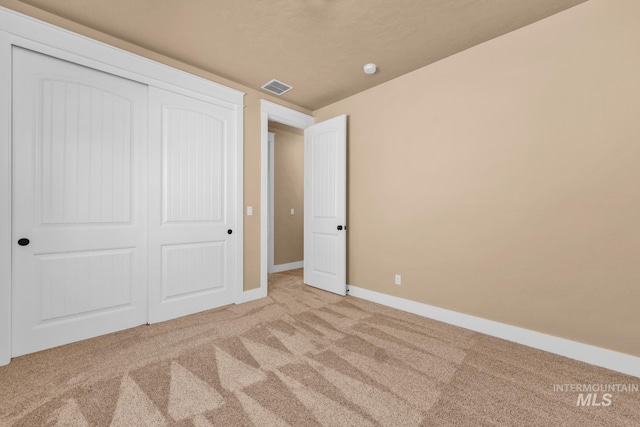 855 N Morley Green Pl, Eagle, ID 83616 - unfurnished bedroom with carpet floors, baseboards, visible vents, and a closet