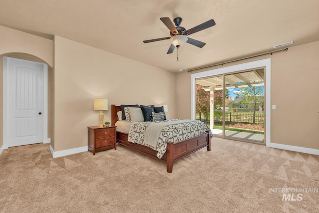 855 N Morley Green Pl, Eagle, ID 83616 - carpeted bedroom featuring visible vents, a ceiling fan, baseboards, access to outside, and arched walkways