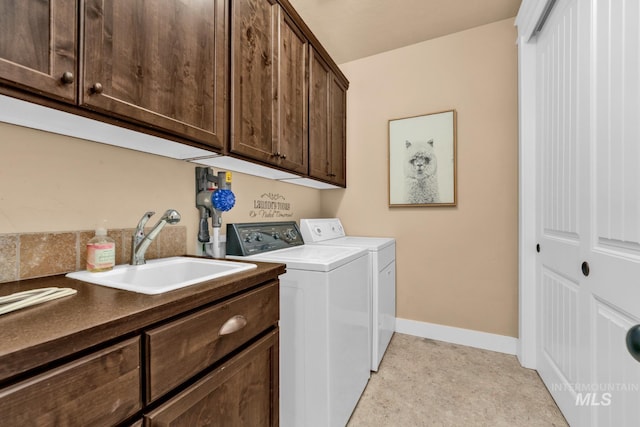 855 N Morley Green Pl, Eagle, ID 83616 - laundry room with washer and dryer, baseboards, a sink, and cabinet space
