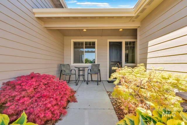 855 N Morley Green Pl, Eagle, ID 83616 - entrance to property with outdoor dining area and a patio area