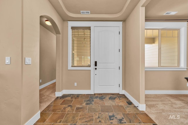 855 N Morley Green Pl, Eagle, ID 83616 - entrance foyer featuring visible vents, stone finish flooring, and baseboards