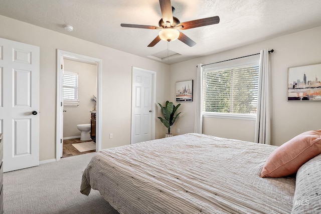 868 S Wiston Pl, Kuna, ID 83634 - bedroom with carpet, ensuite bathroom, baseboards, and ceiling fan