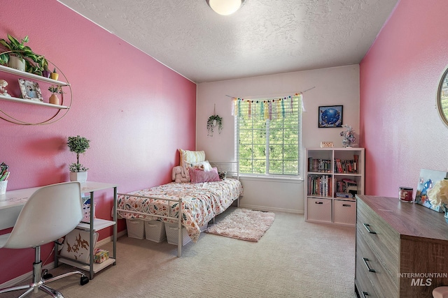 868 S Wiston Pl, Kuna, ID 83634 - bedroom featuring a textured ceiling, light carpet, an office area, and baseboards