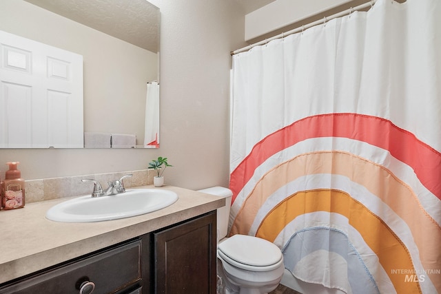 868 S Wiston Pl, Kuna, ID 83634 - full bathroom featuring toilet, vanity, and a shower with curtain