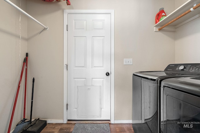 868 S Wiston Pl, Kuna, ID 83634 - laundry room featuring washer and clothes dryer, dark wood finished floors, and baseboards