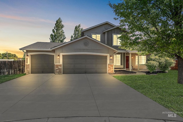 868 S Wiston Pl, Kuna, ID 83634 - view of front of home featuring a garage, concrete driveway, and brick siding