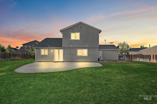 868 S Wiston Pl, Kuna, ID 83634 - back of house at dusk with a patio