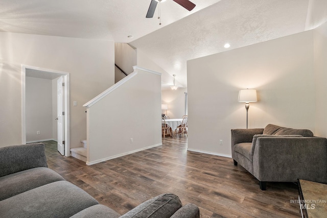 868 S Wiston Pl, Kuna, ID 83634 - living room featuring stairs, vaulted ceiling, ceiling fan, wood finished floors, and baseboards