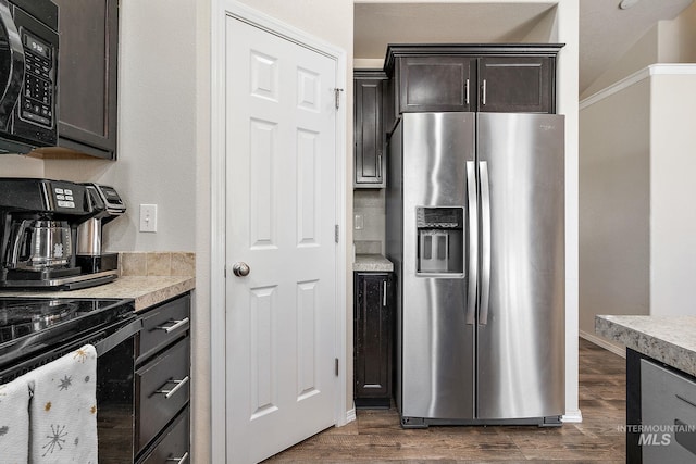 868 S Wiston Pl, Kuna, ID 83634 - kitchen with stainless steel refrigerator with ice dispenser, light countertops, dark wood-style flooring, and dark brown cabinets