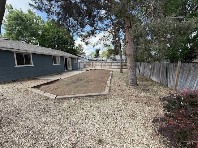 10342 W Ardyce St, Boise, ID 83704 - fenced backyard featuring a patio