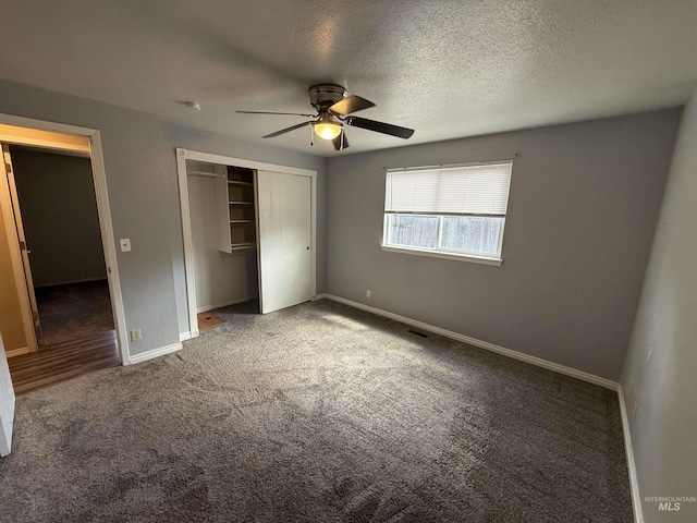 10342 W Ardyce St, Boise, ID 83704 - unfurnished bedroom featuring carpet, a closet, baseboards, a ceiling fan, and a textured ceiling