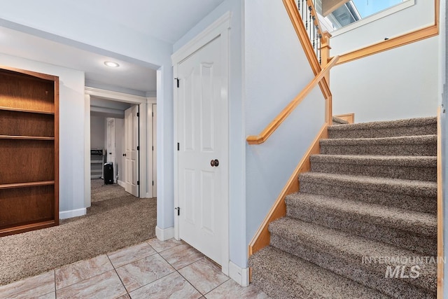 stairs with carpet floors