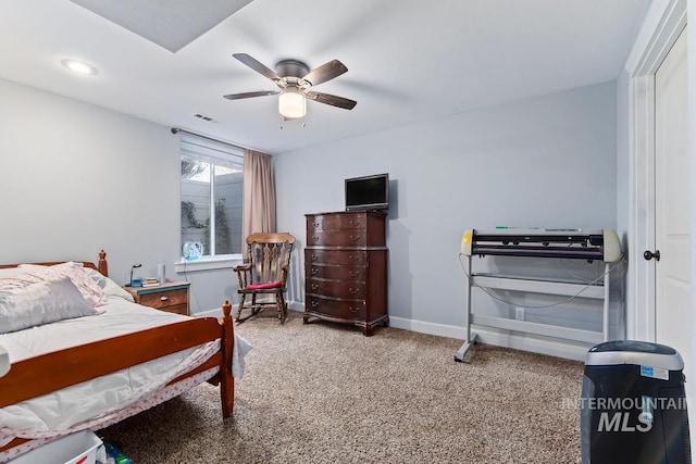 carpeted bedroom featuring ceiling fan