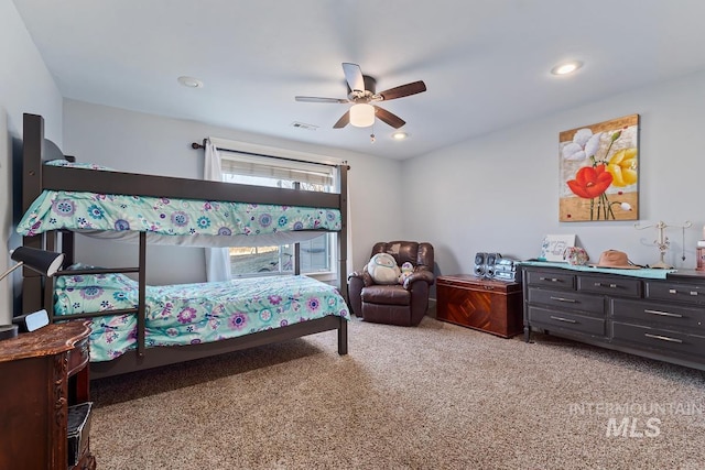 bedroom featuring ceiling fan and light colored carpet