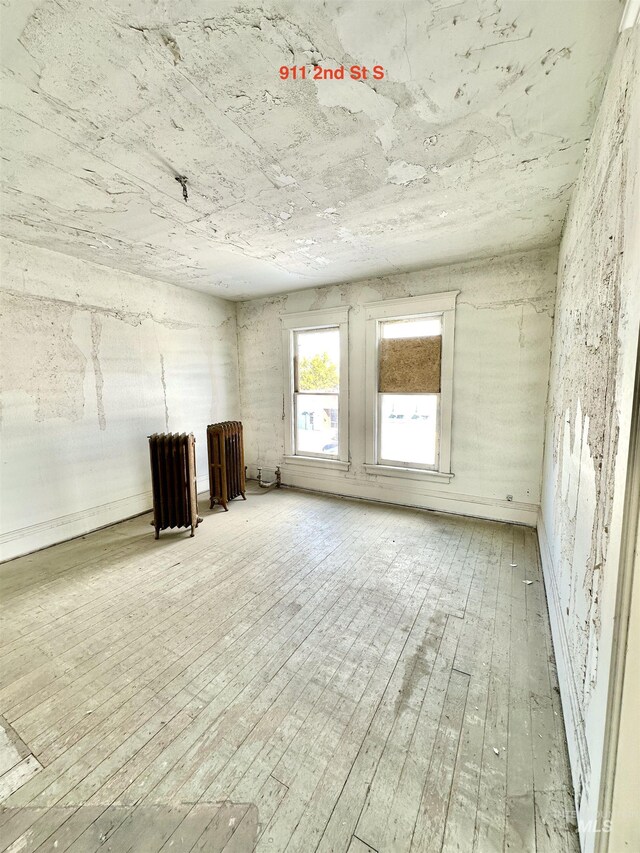 interior space with hardwood / wood-style flooring