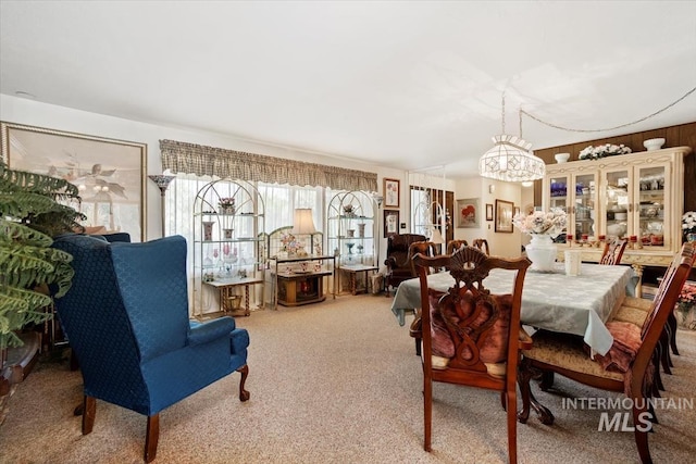 23743 Viking Ln, Wilder, ID 83676 - dining area featuring carpet flooring and a chandelier
