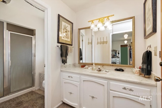 23743 Viking Ln, Wilder, ID 83676 - bathroom with a stall shower, vanity, and a chandelier