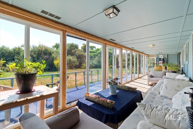 23743 Viking Ln, Wilder, ID 83676 - sunroom / solarium with an outdoor living space