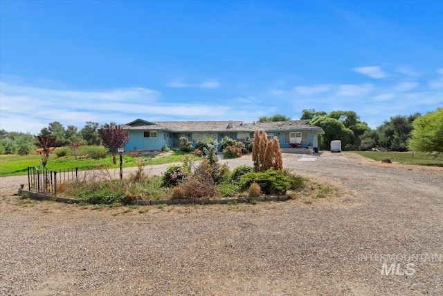 23743 Viking Ln, Wilder, ID 83676 - ranch-style house with dirt driveway
