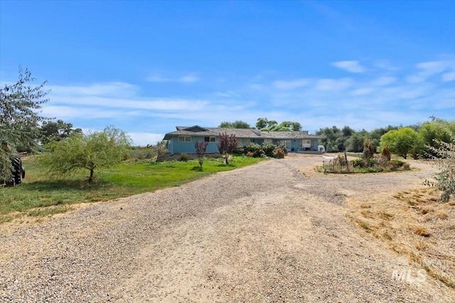 23743 Viking Ln, Wilder, ID 83676 - ranch-style home with dirt driveway