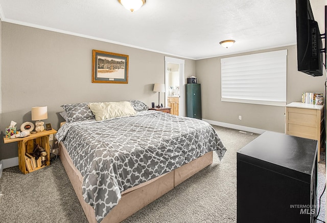 carpeted bedroom featuring crown molding