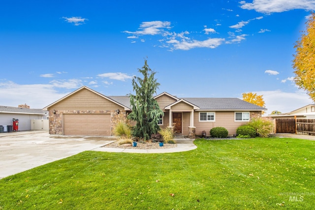 view of front of property with a front lawn and a garage