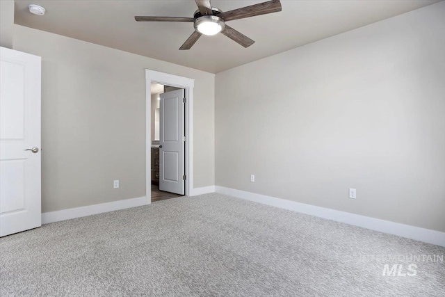 unfurnished bedroom featuring ceiling fan and carpet floors