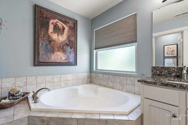 998 E Shadow Creek Ln, Eagle, ID 83616 - full bathroom featuring vanity and a garden tub